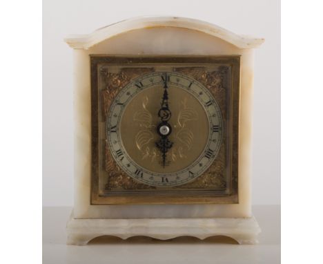 Elliott mantle clock, onyx case, square brass dial applied with cast spandrels, 16cm tall.
