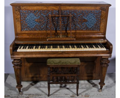 Victorian upright piano, the top with hinged section, fretwork and fabric-backed panel to the front, hexagonal legs to the fr