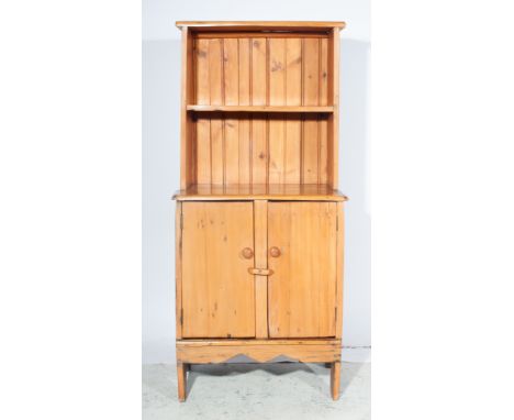 Continental fruitwood dresser, single shelf to back with pair of cupboards, together with a similar side table and chair, wit