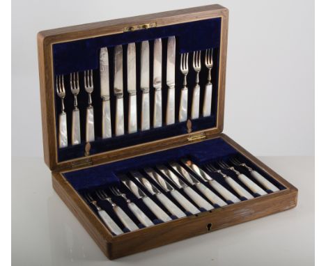 Set of six silver bladed fish knives and forks, Sheffield 'd', in an oak fitted box, 35cm; set of cased silver-plated cutlery