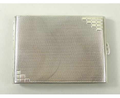 A silver match sleeve with engine turned decoration, Goldsmiths & Silversmiths Company, London 1931. 