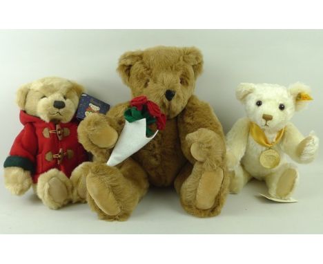 A Steiff Millennium champagne mohair teddy bear, boxed, a Telegram Teddy with a bouquet, boxed, and a Harrods 2003 Christmas 