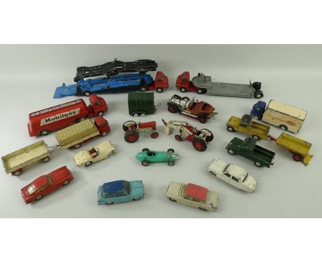 A quantity of Corgi die cast toys to include a Triumph TR2, a Land Rover, a Carrimore Machine carrier, a car transporter, an 