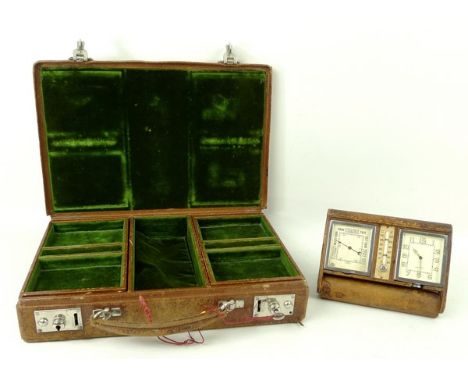 A 1940's Le Coultre Swiss leather cased travel alarm clock/barometer, together with a 1940's Harrods leather jewellery briefc