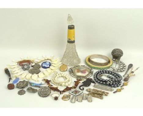 A quantity of costume jewellery, comprising a 9ct gold and horn brooch, a silver bangle engraved with decoration, two micro-m