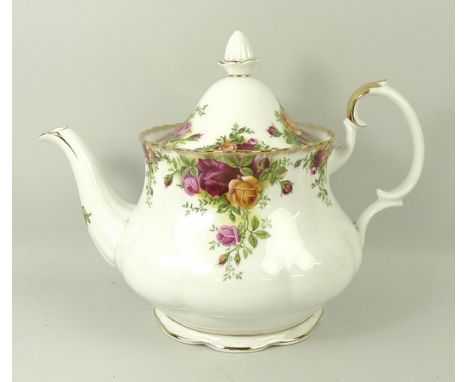 A Royal Albert porcelain part tea service decorated in the 'Old Country Roses' pattern, comprising; teapot, cream jug, slop b