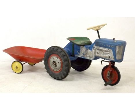 A 1960s Triang tractor with trailer, 51cm high. 