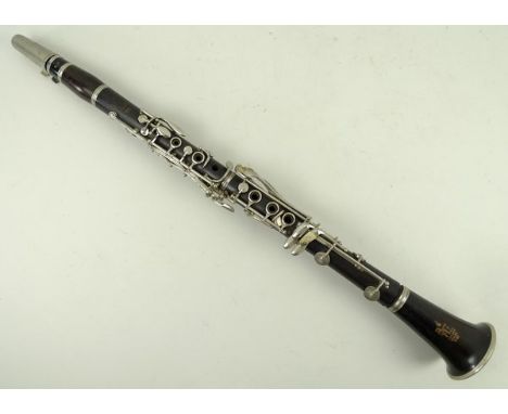 A Boosey & Hawkes Series 2-20 rosewood clarinet, cased with spare reeds. 