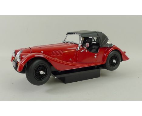 A quantity of Minichamps models, scale 1:18, including a Morris Minor Cabriolet, a Model Icons Jaguar Mark 2, Kyosho Morgan 4