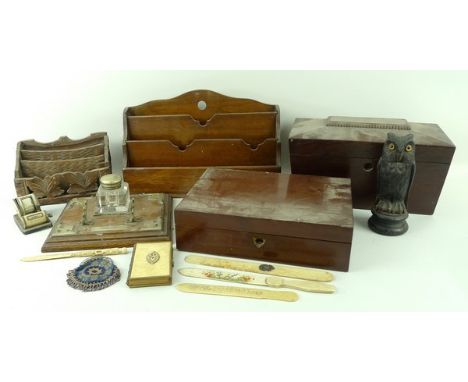 A Victorian mahogany writing box, 26 by 18 by 7cm, a 19th century mahogany letter rack, 31 by 9 by 20cm, a Black forest lette