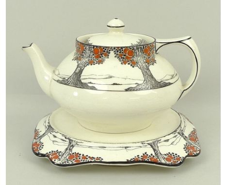 A Crown Ducal pottery part tea service decorated in the 'Orange Tree' pattern, comprising; tea pot and stand, a milk jug, sug