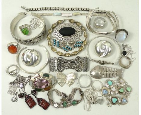 A quantity of silver and gem set jewellery including a Scottish amethyst and agate set brooch, fish brooch, agate set heart l