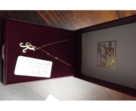 9 carat gold K pendant and chain