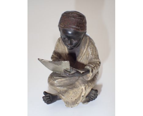 Bergman cold painted bronze Arab scribe with B in vase and 27?? stamped to jacket CONDITION REPORT: Book is bent and wear to 