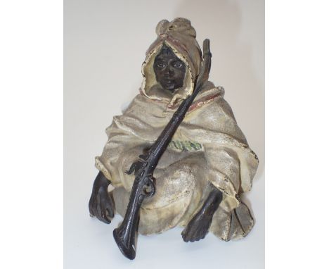 Bergman cold painted bronze Arab guard with B in vase mark and numbers stamped to cloak H: 9 cm CONDITION REPORT: Gun barrel 