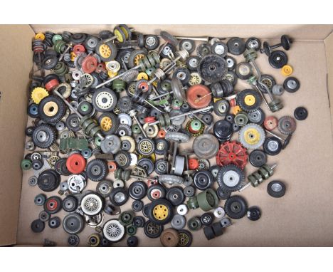 Large collection of Dinky Corgi Matchbox and other makers spare Wheels Tyres and Axles, most appear for Civilian vehicles, in