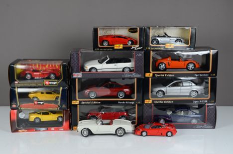 1:18 and 1:24 Scale Model Cars, mainly boxed comprises 1:18 scale by Maisto 32812 1993 BMW 325i, 31615 Opel Speedster, 31619 