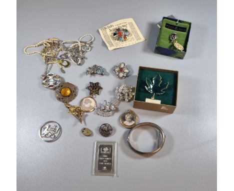 Collection of costume jewellery: brooches, necklaces etc. together with silver bangle and 1 troy oz Swisse Ingot and Scandina