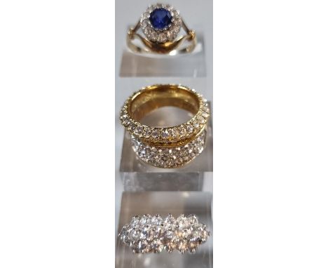 9ct gold blue and white stone cluster ring.  3.3g size O.  together with three other dress rings, modernist design etc.  (4) 