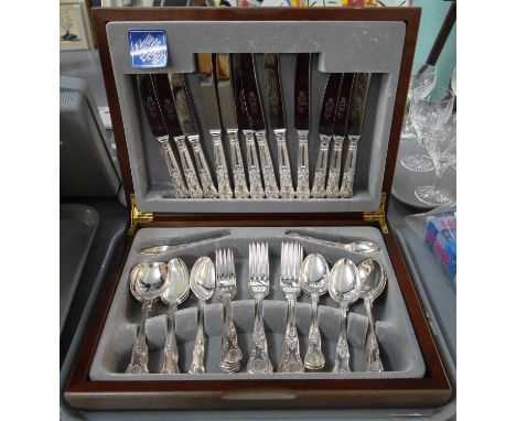 Wooden cased canteen of Sheffield silver plated cutlery.(B.P. 21% + VAT) 