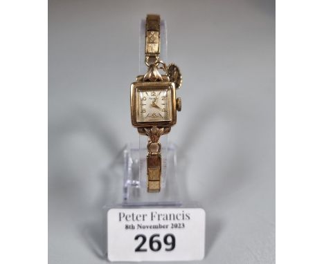 9ct gold square faced Rotary ladies wristwatch with 9ct gold bracelet.  18g approx.   (B.P. 21% + VAT) 