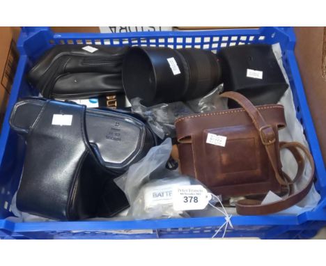 Collection of photographic equipment to include: Minolta 7000 SLR camera in Eveready case, Sigma zoom lens, vintage folding c