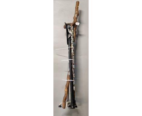 Group of assorted hiking sticks with shields, mobility walking stick an a plastic shooting stick.  (B.P. 21% + VAT) 
