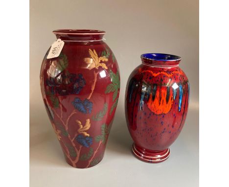 A pair of red glazed baluster vases; one flambe glazed Poole pottery and one Park Rose Bridlington pottery spongeware floral 