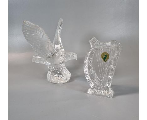 A Waterford crystal study of an eagle with spread wings, together with a Waterford crystal harp ornament. (2) (B.P. 21% + VAT