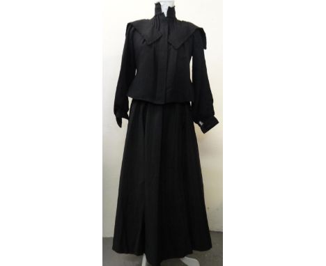 Victorian/Edwardian black outfit comprising: a full length black skirt and a black woollen crepe jacket with dagger collar, l