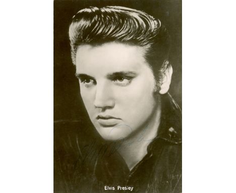 PRESLEY ELVIS: (1935-1977) American Rock and Roll Singer. Vintage signed postcard photograph of the handsome Presley in a hea