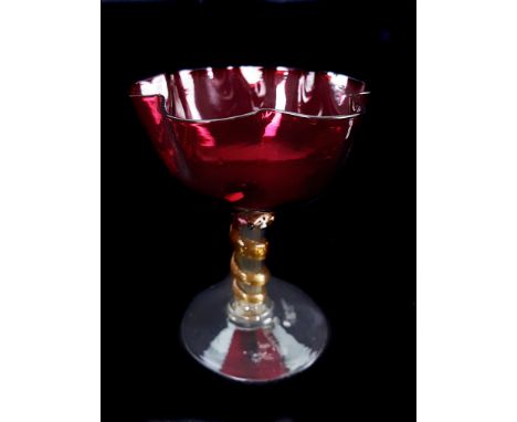 A Salviati glass snake challis, the ruby bowl of lobed form on colourless glass stem and foot encircled by aventurine snake w