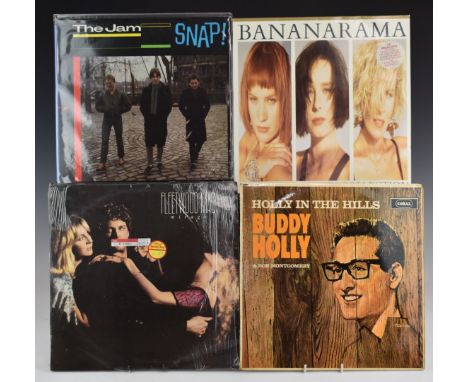 Approximately 100 albums including Genesis, Crystal Gayle, Jimi Hendrix, Elton John, Phil Collins, Carpenters, Chaka Khan, Bu