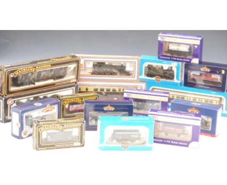 Sixteen Bachmann, Mainline, Airfix, Dapol and Lima 00 gauge model railway locomotives, wagons and vans including MWG 22, GWR 