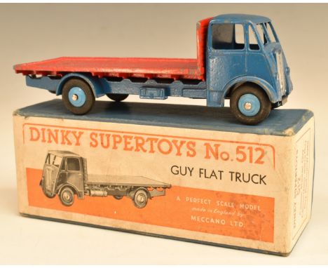 Dinky Supertoys diecast model Guy Flat Truck with red bed, dark blue cab and chassis and pale blue hubs, 512, in original box