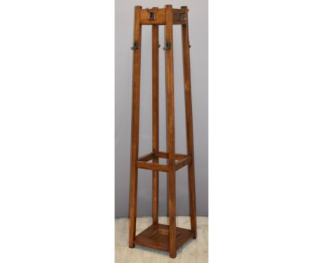 Oak coat/hat stand with stick or umbrella stand to centre, H173cm