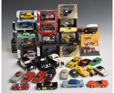 Forty-four Corgi, Dinky, IXO Models, Matchbox and similar diecast model cars and motorbikes, some in original boxes.&nbsp;