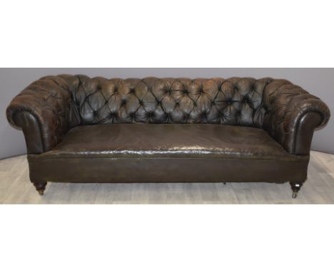 Leather Chesterfield sofa with turned front legs and castors stamped Hampton &amp; Son, L210cm
