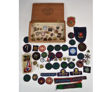 A collection of Girl Guide cloth and enamel badges, together with Boy Scouts, Baden - Powell and coronation badges