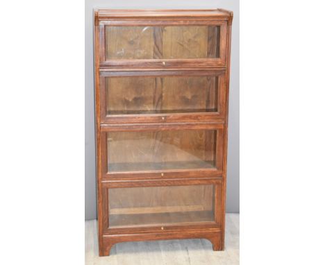 Oak Globe Wernicke style four tier bookcase with up and over glazed doors, W71 x D29 x H134cm