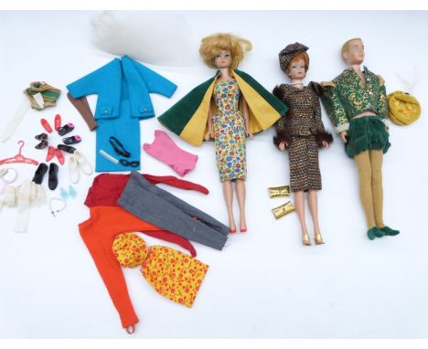 Two Mattel 1962&nbsp;Midge Barbie dolls together with a 1960 Ken 2nd edition doll and a variety of vintage clothing and acces