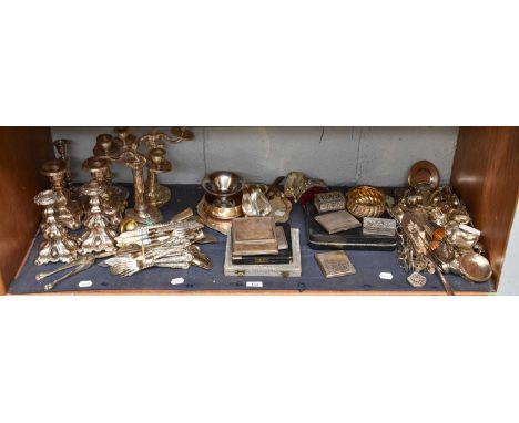 A Collection of Assorted Silver Plate, including a pair of candelabra; pairs of candlesticks; various items for the table and