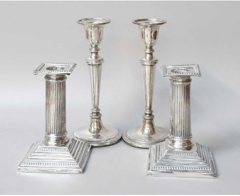 A Pair of Victorian Silver Candlesticks, by John Troup, London, 1893, each on stepped square base with beaded borders, with f