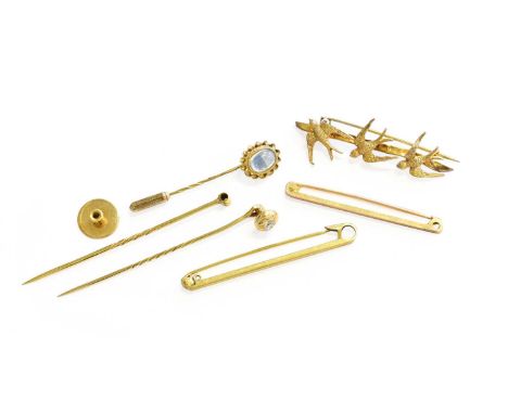 A Diamond Dress Stud/Stick Pin, stud diameter 0.7cm, pin length 6.5cm; A 9 Carat Gold Moonstone Stick Pin, length 4cm; A Stic