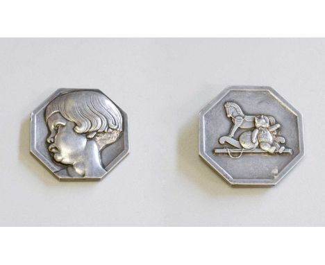 A French Silver Medallion, by Pierre Turin, 20th Century, octagonal, one side cast with a portrait bust of a child, the other