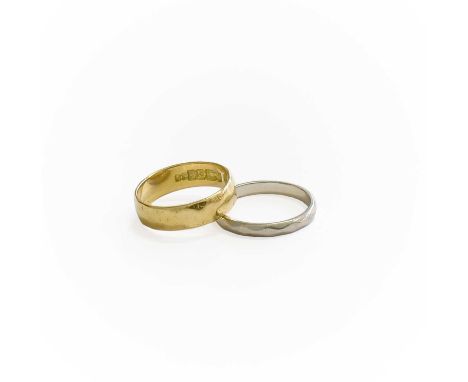 An 18 Carat Gold Band Ring, finger size K; and A Platinum Band Ring, finger size K18 carat gold ring - 3.1 grams Platinum rin