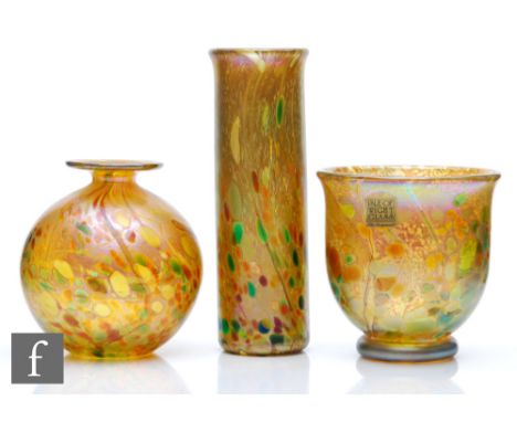 A collection of contemporary Isle of Wight glass comprising a cylindrical vase, a globe vase and a small footed ovoid example