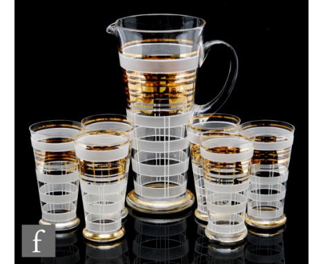 A 20th Century clear crystal glass lemonade set, comprising a jug of tall flared form with loop handle and six tumblers all w