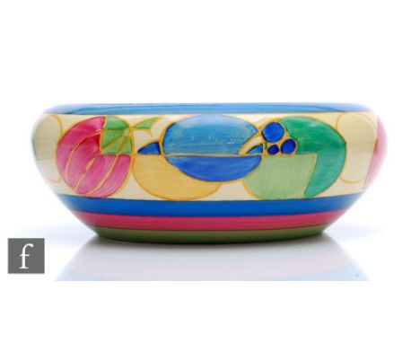 A large Clarice Cliff shape 56 bowl circa 1931 hand painted in the Pastel Melon pattern with a band of abstract fruit in pink