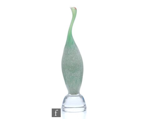 A post war glass sculpture of a stylised crane designed by Vicke Lindstrand for Kosta circa 1951, with mottled green body and